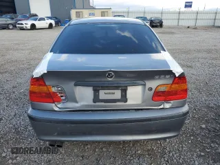 2004 BMW 3 Series 325i with VIN WBAET37474NJ95589, listed as a Copart auction lot 43966055 with 214,638 mi miles and Salvage Title. Bid and sale history available at carsss.com. Image 6.