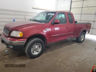 2001 Ford F-150 XL z VIN 1FTRX18W11KF28539, wystawiony jako Copart lot #58630595 z przebiegiem 140 042 mil mil oraz Czysty tytuł • Clean title. Historia ofert i sprzedaży dostępna na DreamBid. Obrazek 1.