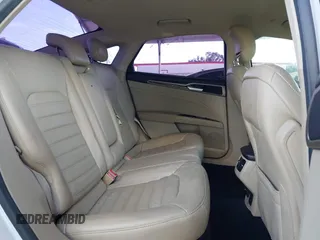 2013 Ford Fusion SE Hybrid z VIN 3FA6P0LU1DR310075, wystawiony jako IAAI lot #42085556 z przebiegiem Nie podano mil oraz . Historia ofert i sprzedaży dostępna na DreamBid. Obrazek 8.