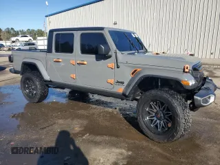 2022 Jeep Gladiator Willys with VIN 1C6HJTAG7NL117102, listed as a Copart auction lot 87679075 with 28,196 mi miles and Salvage title. Bid and sale history available at DreamBid. Image 4.