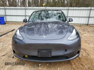 2023 Tesla Model Y Long Range z VIN 7SAYGDEE5PA164270, wystawiony jako Copart lot #50260835 z przebiegiem 17 340 mil mil oraz Szkoda całkowita • Salvage title. Historia ofert i sprzedaży dostępna na DreamBid. Obrazek 5.
