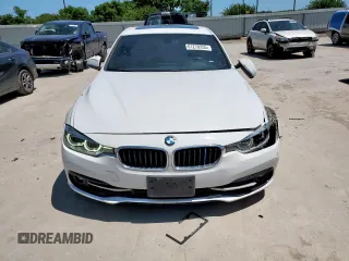 2018 BMW 3 Series 330i with VIN WBA8B9C57JEE80972, listed as a Copart auction lot 61270255 with 81,658 mi miles and Salvage title. Bid and sale history available at DreamBid. Image 5.