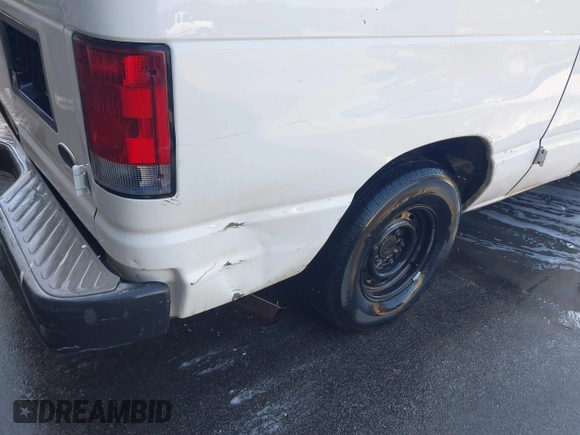 2003 Ford Econoline Cargo with VIN 1FTRE14W03HB60401, listed as a IAAI auction lot 41852847 with 325,883 mi miles. Bid and sale history available at carsss.com. Image 6.