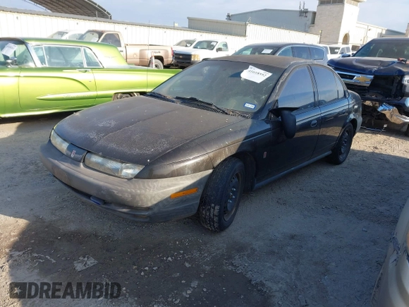 1996 Saturn SL with VIN 1G8ZF5289TZ265189, listed as a IAAI auction lot 41618552 with 264,742 mi miles. Bid and sale history available at carsss.com. Image 2.