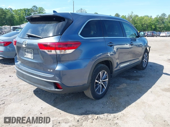 2019 Toyota Highlander SE with VIN 5TDKZRFH1KS290412, listed as a IAAI auction lot 42272229 with 74,212 mi miles and . Bid and sale history available at DreamBid. Image 4.
