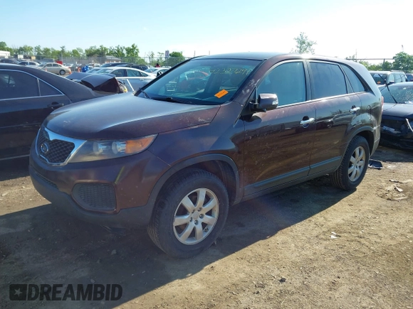 2013 Kia Sorento LX with VIN 5XYKT3A17DG375103, listed as a IAAI auction lot 42327291 with 228,761 mi miles and . Bid and sale history available at DreamBid. Image 2.
