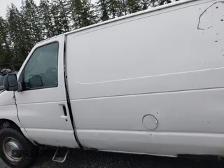 2004 Ford Econoline Cargo with VIN 1FTSS34L84HA56056, listed as a IAAI auction lot 41235862 with 215,095 mi miles and . Bid and sale history available at DreamBid. Image 14.