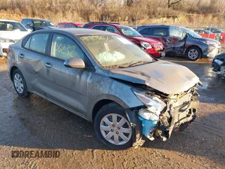 2021 Kia Rio S with VIN 3KPA24AD6ME398934, listed as a IAAI auction lot 41406232 with 14,218 mi miles. Bid and sale history available at carsss.com. Image 1.