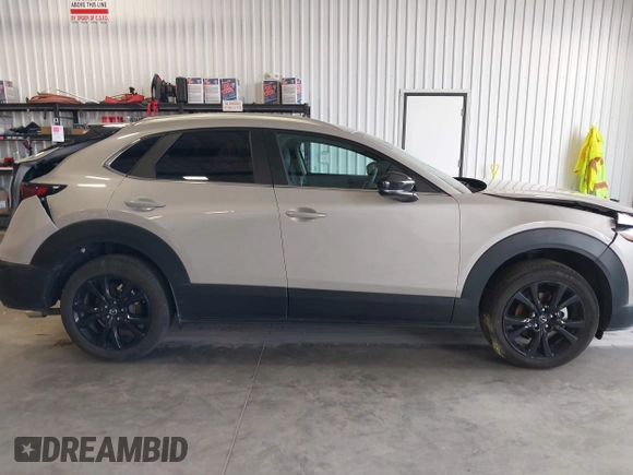 2024 Mazda CX-30 S Select Sport with VIN 3MVDMBBM0RM698491, listed as a IAAI auction lot 42609161 with 21,576 mi miles and . Bid and sale history available at DreamBid. Image 14.