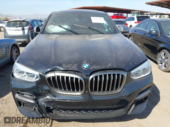 2020 BMW X4 M40i with VIN 5UX2V5C04L9D26548, listed as a IAAI auction lot 42473480 with Not provided miles and . Bid and sale history available at DreamBid. Image 6.