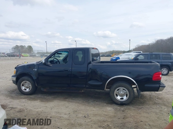 2000 Ford F-150 XL with VIN 1FTZX0725YKA09559, listed as a IAAI auction lot 41810954 with Not provided miles and . Bid and sale history available at DreamBid. Image 14.