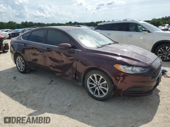 2017 Ford Fusion SE with VIN 3FA6P0H76HR415381, listed as a Copart auction lot 62000325 with 173,319 mi miles and Salvage title. Bid and sale history available at DreamBid. Image 4.