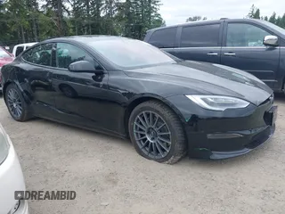 2021 Tesla Model S Plaid with VIN 5YJSA1E62MF447509, listed as a IAAI auction lot 42509281 with 32,372 mi miles and . Bid and sale history available at DreamBid. Image 1.