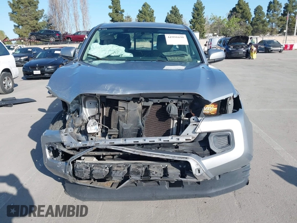 2017 Toyota Tacoma SR with VIN 5TFSX5EN9HX054583, listed as a IAAI auction lot 41991690 with 129,524 mi miles and . Bid and sale history available at DreamBid. Image 12.
