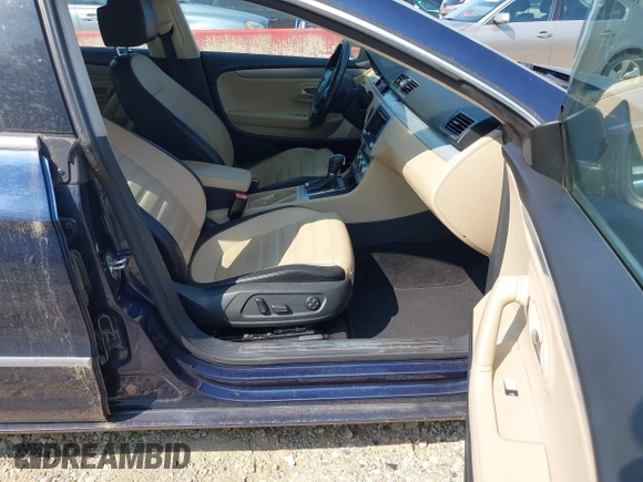 2013 Volkswagen CC Sport Plus z VIN WVWBP7ANXDE553061, wystawiony jako IAAI lot #42468114 z przebiegiem 106 812 mil mil oraz . Historia ofert i sprzedaży dostępna na DreamBid. Obrazek 5.