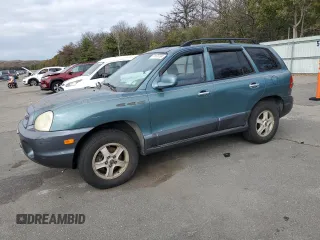 2003 Hyundai Santa Fe GLS with VIN KM8SC73D03U421863, listed as a Copart auction lot 71573724 with 184,028 mi miles and Salvage Title. Bid and sale history available at carsss.com. Image 1.