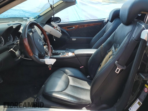 2007 Mercedes-Benz SL with VIN WDBSK77F27F117199, listed as a Copart auction lot 58724645 with 75,648 mi miles and Salvage title. Bid and sale history available at DreamBid. Image 7.