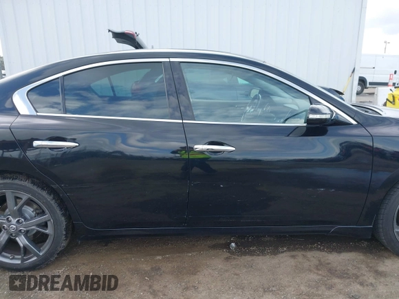 2014 Nissan Maxima S with VIN 1N4AA5AP9EC908498, listed as a IAAI auction lot 41945171 with 130,090 mi miles and . Bid and sale history available at DreamBid. Image 14.