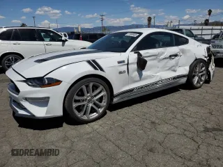 2022 Ford Mustang GT with VIN 1FA6P8CF9N5136633, listed as a Copart auction lot 51869985 with 34,974 mi miles and Salvage Title. Bid and sale history available at carsss.com. Image 1.