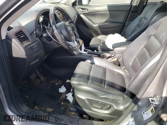 2015 Mazda CX-5 Grand Touring with VIN JM3KE2DY5F0507904, listed as a Copart auction lot 50542895 with 160,736 mi miles and Salvage Title. Bid and sale history available at carsss.com. Image 7.