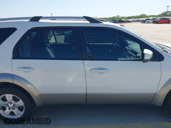 2007 Ford Freestyle SEL z VIN 1FMDK02187GA35979, wystawiony jako IAAI lot #41998912 z przebiegiem 87 941 mil mil oraz . Historia ofert i sprzedaży dostępna na DreamBid. Obrazek 13.