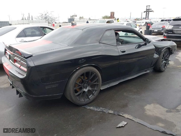 2015 Dodge Challenger R/T Plus with VIN 2C3CDZBT6FH924089, listed as a IAAI auction lot 41472696 with 87,089 mi miles. Bid and sale history available at carsss.com. Image 4.