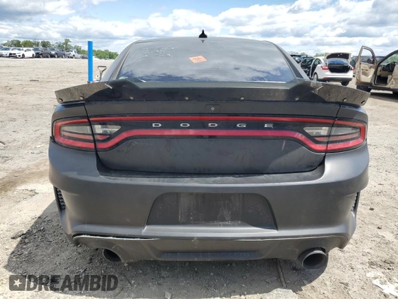 2015 Dodge Charger RT with VIN 2C3CDXCT9FH784672, listed as a Copart auction lot 58190615 with 121,033 mi miles and Salvage title. Bid and sale history available at DreamBid. Image 6.