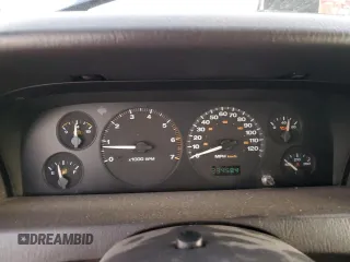 1999 Jeep Grand Cherokee Laredo с VIN 1J4GW58N6XC784679, выставлен на аукционе Copart как лот 85345304 с пробегом 234 584 миль миль и Списание • Salvage title. История ставок и продаж доступна на DreamBid. Изображение 9.