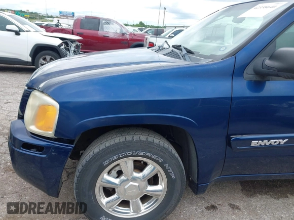 2003 GMC Envoy SLE z VIN 1GKDS13S432414698, wystawiony jako IAAI lot #42338640 z przebiegiem 210 988 mil mil oraz . Historia ofert i sprzedaży dostępna na DreamBid. Obrazek 6.