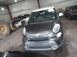 2014 FIAT 500L Trekking with VIN ZFBCFADH6EZ017800, listed as a IAAI auction lot 42572995 with 99,646 mi miles and . Bid and sale history available at DreamBid. Image 12.
