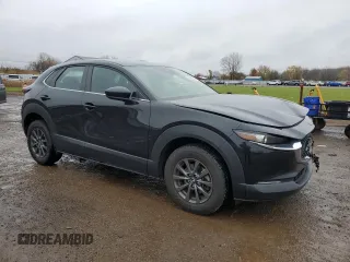 2021 Mazda CX-30 S with VIN 3MVDMBAL4MM209043, listed as a Copart auction lot 79406284 with 55,944 mi miles and Salvage title. Bid and sale history available at DreamBid. Image 4.