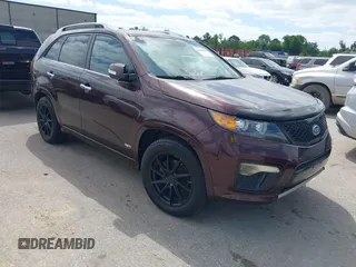 2012 Kia Sorento SX with VIN 5XYKWDA25CG249584, listed as a IAAI auction lot 42008349 with 214,381 mi miles. Bid and sale history available at carsss.com. Image 1.