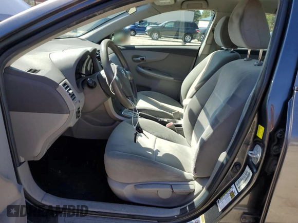 2010 Toyota Corolla with VIN 1NXBU4EEXAZ374677, listed as a Copart auction lot 49790675 with 293,377 mi miles and Clean title. Bid and sale history available at DreamBid. Image 7.