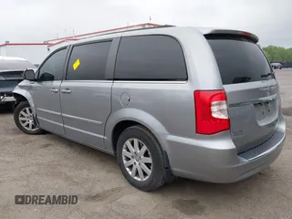 2014 Chrysler Town & Country Touring with VIN 2C4RC1BG5ER280297, listed as a IAAI auction lot 42189192 with 123,864 mi miles. Bid and sale history available at carsss.com. Image 3.