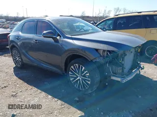 2024 Lexus RX with VIN 2T2BBMCA5RC049966, listed as a IAAI auction lot 41597363 with 12,936 mi miles. Bid and sale history available at carsss.com. Image 1.
