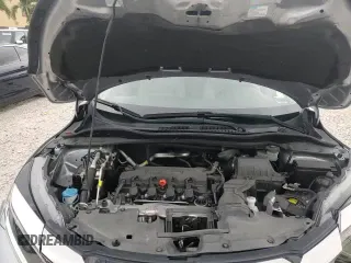 2021 Honda HR-V LX с VIN 3CZRU5H30MM709726, выставлен на аукционе Copart как лот 70661185 с пробегом 87 042 миль миль и На запчасти • Non repairable. История ставок и продаж доступна на DreamBid. Изображение 13.