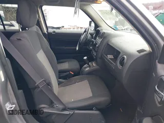 2014 Jeep Patriot Latitude with VIN 1C4NJRFB6ED778433, listed as a IAAI auction lot 41211522 with 127,506 mi miles. Bid and sale history available at carsss.com. Image 5.