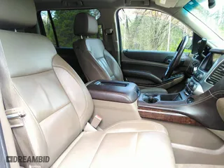 2015 Chevrolet Suburban LT with VIN 1GNSCJKC6FR229260, listed as a IAAI auction lot 41974363 with 251,395 mi miles. Bid and sale history available at carsss.com. Image 5.