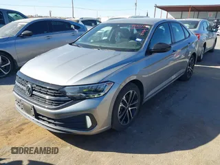 2023 Volkswagen Jetta Sport with VIN 3VWBM7BU5PM016768, listed as a IAAI auction lot 41427777 with 32,950 mi miles and . Bid and sale history available at DreamBid. Image 2.