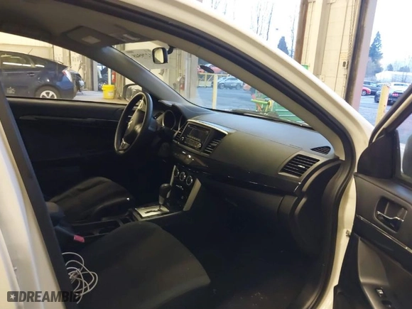 2016 Mitsubishi Lancer ES with VIN JA32U2FU7GU003157, listed as a IAAI auction lot 41279548 with 111,831 mi miles. Bid and sale history available at carsss.com. Image 5.