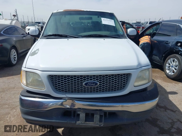 1999 Ford F-150 with VIN 1FTZX1720XKB31945, listed as a IAAI auction lot 42123984 with 187,766 mi miles and . Bid and sale history available at DreamBid. Image 12.