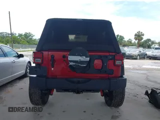 2012 Jeep Wrangler Unlimited Sport z VIN 1C4BJWDG3CL207291, wystawiony jako IAAI lot #42211454 z przebiegiem 110 864 mil mil oraz . Historia ofert i sprzedaży dostępna na DreamBid. Obrazek 17.