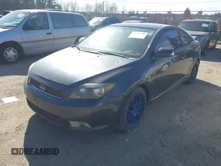 2006 Scion tC with VIN JTKDE177860107651, listed as a IAAI auction lot 41753758 with 212,401 mi miles. Bid and sale history available at carsss.com. Image 2.
