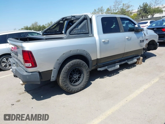 2016 Ram 1500 Rebel z VIN 1C6RR7YT5GS251994, wystawiony jako IAAI lot #42139378 z przebiegiem 102 736 mil mil oraz . Historia ofert i sprzedaży dostępna na DreamBid. Obrazek 4.