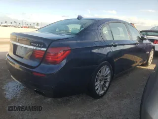 2015 BMW 7 Series 750Li xDrive with VIN WBAYF8C58FD654184, listed as a Copart auction lot 77203184 with 122,955 mi miles and Non Repairable. Bid and sale history available at DreamBid. Image 3.