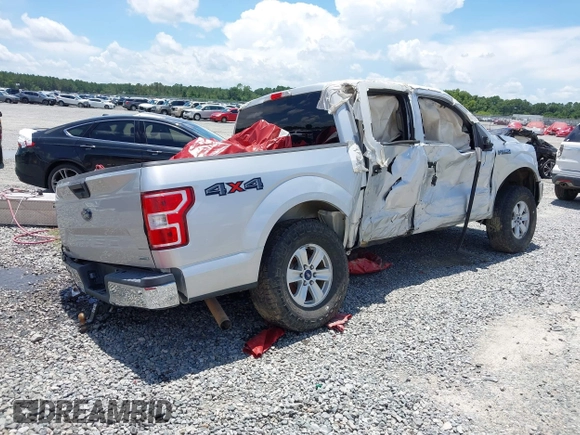 2018 Ford F-150 XL with VIN 1FTEW1EG6JFD14007, listed as a IAAI auction lot 36180966 with 124,521 mi miles and . Bid and sale history available at DreamBid. Image 4.