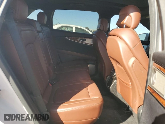 2016 Lincoln MKX Reserve z VIN 2LMPJ6LP7GBL54002, wystawiony jako Copart lot #48757875 z przebiegiem 128 008 mil mil oraz Szkoda całkowita • Salvage title. Historia ofert i sprzedaży dostępna na DreamBid. Obrazek 10.