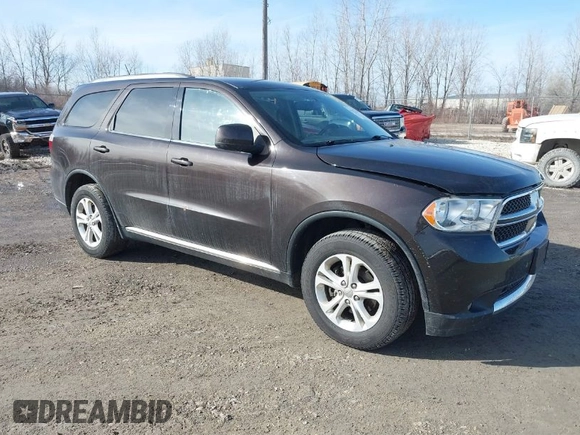 2013 Dodge Durango SXT with VIN 1C4RDJAG3DC512367, listed as a IAAI auction lot 41721437 with 176,092 mi miles. Bid and sale history available at carsss.com. Image 1.