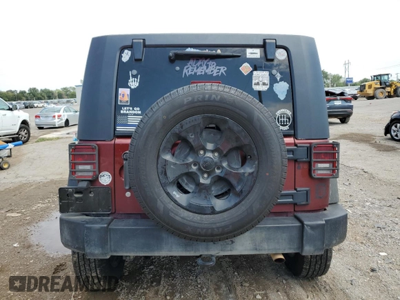 2007 Jeep Wrangler Unlimited Sahara z VIN 1J8GB59107L203053, wystawiony jako Copart lot #66549364 z przebiegiem Nie podano mil oraz Szkoda całkowita • Salvage title. Historia ofert i sprzedaży dostępna na DreamBid. Obrazek 6.