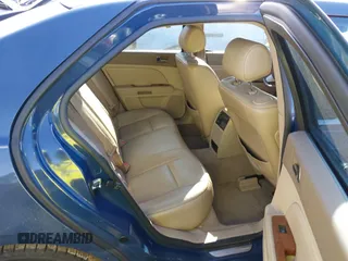 2009 Cadillac STS AWD w/1SB with VIN 1G6DD67VX90130281, listed as a IAAI auction lot 41384191 with 102,943 mi miles. Bid and sale history available at carsss.com. Image 8.